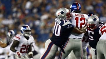 Sep 3, 2015; Foxborough, MA, USA; New England Patriots linebacker Rufus Johnson (70) tackles New York Giants quarterback Ryan Nassib (12) during the second half at Gillette Stadium. Mandatory Credit: Mark L. Baer-USA TODAY Sports