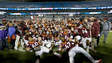 CHARLOTTE, NC - DECEMBER 29: The Virginia Tech Hokies celebrate after defeating the Arkansas Razorbacks 35-24 in the Belk Bowl at Bank of America Stadium on December 29, 2016 in Charlotte, North Carolina. (Photo by Streeter Lecka/Getty Images)