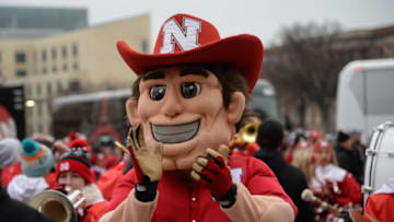 LINCOLN, NE - NOVEMBER 17: The mascot for the Nebraska Cornhuskers lead the team to the stadium before the game against the Michigan State Spartans at Memorial Stadium on November 17, 2018 in Lincoln, Nebraska. (Photo by Steven Branscombe/Getty Images)