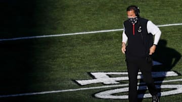 Cincinnati Bearcats head coach Luke Fickell heads for the sideline. USA Today.