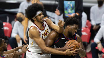 Feb 27, 2021; Philadelphia, Pennsylvania, USA; Philadelphia 76ers center Joel Embiid (21) and Cleveland Cavaliers center Jarrett Allen (31) during the second quarter at Wells Fargo Center. Mandatory Credit: Bill Streicher-USA TODAY Sports