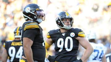 Nov 3, 2019; Pittsburgh, PA, USA; Pittsburgh Steelers linebacker T.J. Watt (90) and defensive end Cameron Heyward (97) watch a replay against the Indianapolis Colts during the fourth quarter at Heinz Field. The Steelers won 26-24. Mandatory Credit: Philip G. Pavely-USA TODAY Sports