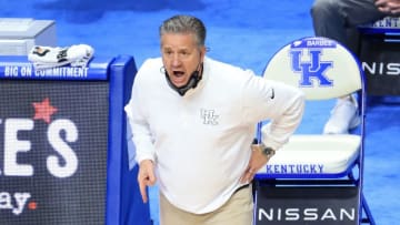 LEXINGTON, KENTUCKY - FEBRUARY 13: John Calipari the head coach of the Kentucky Wildcats gives instructions to his team against the Auburn Tigers at Rupp Arena on February 13, 2021 in Lexington, Kentucky. (Photo by Andy Lyons/Getty Images)