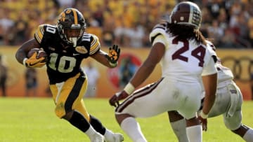 TAMPA, FL - JANUARY 01: Mekhi Sargent #10 of the Iowa Hawkeyes rushes during the 2019 Outback Bowl against the Mississippi State Bulldogs at Raymond James Stadium on January 1, 2019 in Tampa, Florida. (Photo by Mike Ehrmann/Getty Images)