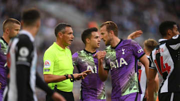 NEWCASTLE UPON TYNE, ENGLAND - OCTOBER 17: Sergio Reguilon and Harry Kane of Spurs point out the medical incident in the East Stand to match referee Andre Mariner as Matt Ritchie (r) looks on during the Premier League match between Newcastle United and Tottenham Hotspur at St. James Park on October 17, 2021 in Newcastle upon Tyne, England. (Photo by Stu Forster/Getty Images)