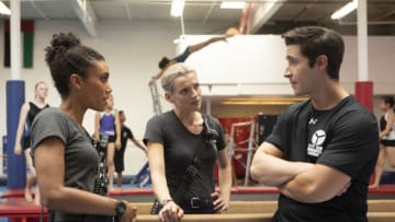 CHICAGO FIRE -- "This Isn't Charity" Episode 704 -- Pictured: (l-r) Annie Ilonzeh as Emily Foster, Kara Killmer as Sylvie Brett, Jeff Kurysz as Coach Dorman -- (Photo by: Adrian Burrows/NBC)