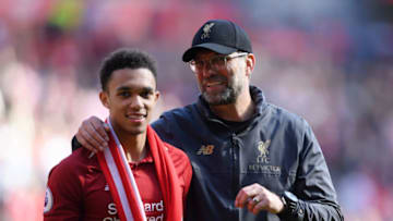 LIVERPOOL, ENGLAND - MAY 12: Jurgen Klopp, Manager of Liverpool embraces Trent Alexander-Arnold of Liverpool after the Premier League match between Liverpool FC and Wolverhampton Wanderers at Anfield on May 12, 2019 in Liverpool, United Kingdom. (Photo by Laurence Griffiths/Getty Images)