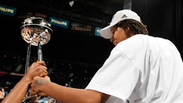 ATLANTA, GA - OCTOBER 07: Seimone Augustus #33 of the Minnesota Lynx celebrates their 73-67 win over the Atlanta Dream in Game Three of the 2011 WNBA Finals at Philips Arena on October 7, 2011 in Atlanta, Georgia. NOTE TO USER: User expressly acknowledges and agrees that, by downloading and or using this Photograph, user is consenting to the terms and conditions of the Getty Images License Agreement. (Photo by Kevin C. Cox/Getty Images)
