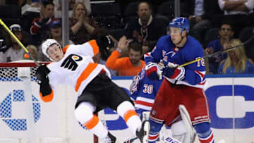 NEW YORK, NEW YORK - SEPTEMBER 26: Brady Skjei #76 of the New York Rangers checks Joel Farabee #49 of the Philadelphia Flyers during the second period during a preseason game at Madison Square Garden on September 26, 2019 in New York City. (Photo by Bruce Bennett/Getty Images)