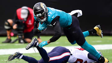 JACKSONVILLE, FLORIDA - NOVEMBER 08: D.J. Chark #17 of the Jacksonville Jaguars runs with the ball after the catch as Phillip Gaines #29 of the Houston Texans defends during the first half at TIAA Bank Field on November 08, 2020 in Jacksonville, Florida. (Photo by Douglas P. DeFelice/Getty Images)