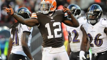 Nov 3, 2013; Cleveland, OH, USA; Cleveland Browns wide receiver Josh Gordon (12) signals first down after a catch against the Baltimore Ravens during the first quarter at FirstEnergy Stadium. Mandatory Credit: Ken Blaze-USA TODAY Sports
