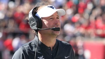 Oct 15, 2016; Lubbock, TX, USA; West Virginia Mountaineers head coach Dana Holgorsen looks on from the sidelines during the game with the Texas Tech Red Raiders at Jones AT&T Stadium. Mandatory Credit: Michael C. Johnson-USA TODAY Sports