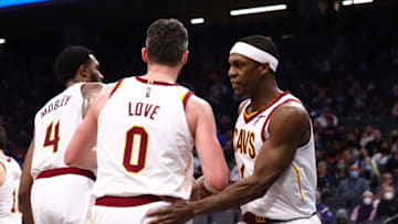 Jan 10, 2022; Sacramento, California, USA; Cleveland Cavaliers guard Rajon Rondo (1) celebrates with forward Kevin Love (0) after Love drew a charge against the Sacramento Kings during the third quarter at Golden 1 Center. Mandatory Credit: Kelley L Cox-USA TODAY Sports