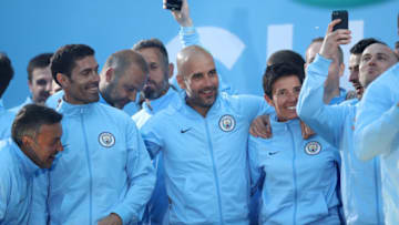 MANCHESTER, ENGLAND - MAY 14: Manchester City Manager Josep Guardiola on stage during the Manchester City Trophy Parade in Manchester city centre on May 14, 2018 in Manchester, England. (Photo by Lynne Cameron/Getty Images)