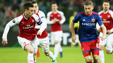 MOSCOW, RUSSIA - APRIL 12: Fedor Chalov of PFC CSKA Moskva vies for the ball with Laurent Koscielny of Arsenal FC during the UEFA Europa League quarter final leg two match between PFC CSKA Moskva and Arsenal FC at CSKA Arena stadium on April 12, 2018 in Moscow, Russia. (Photo by Oleg Nikishin/Getty Images)