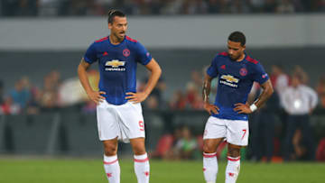 ROTTERDAM, NETHERLANDS - SEPTEMBER 15: Dejected looking Zlatan Ibrahimovic and Memphis Depay of Manchester United during the UEFA Europa League match between Feyenoord and Manchester United at Feijenoord Stadion on September 15, 2016 in Rotterdam, Netherlands. (Photo by Catherine Ivill - AMA/Getty Images)