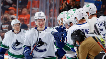 PHILADELPHIA, PENNSYLVANIA - OCTOBER 15: Vasily Podkolzin #92 of the Vancouver Canucks celebrates a goal during the second period against the Philadelphia Flyers at Wells Fargo Center on October 15, 2021 in Philadelphia, Pennsylvania. (Photo by Tim Nwachukwu/Getty Images)
