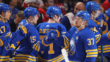 Dec 5, 2023; Buffalo, New York, USA; Buffalo Sabres center Casey Mittelstadt (37) celebrates his goal with teammates during the third period against the Detroit Red Wings at KeyBank Center. Mandatory Credit: Timothy T. Ludwig-USA TODAY Sports