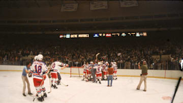 The New York Rangers celebrate their victory over the rival NY Islanders in Game 6 of the Campbell Conference playoffs at Madison Square Garden, New York, New York, May 8, 1979. (Photo by Melchior DiGiacomo/Getty Images)