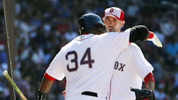 Jul 4, 2016; Boston, MA, USA; Boston Red Sox starting pitcher Rick Porcello (22) is congratulated by designated hitter David Ortiz (34) after the end of the sixth inning against the Texas Rangers at Fenway Park. Mandatory Credit: Winslow Townson-USA TODAY Sports