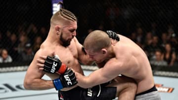 BROOKLYN, NEW YORK - APRIL 07: (L-R) Chris Gruetzemacher knees Joe Lauzon in their lightweight bout during the UFC 223 event inside Barclays Center on April 7, 2018 in Brooklyn, New York. (Photo by Jeff Bottari/Zuffa LLC/Zuffa LLC via Getty Images)