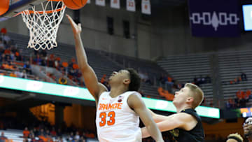 SYRACUSE, NY - OCTOBER 25: Elijah Hughes #33 of the Syracuse Orange shoots the ball past Matt Cerutti #15 of the St. Rose Golden Knights during the second half at the Carrier Dome on October 25, 2018 in Syracuse, New York. Syracuse defeated St. Rose 80-49. (Photo by Rich Barnes/Getty Images)
