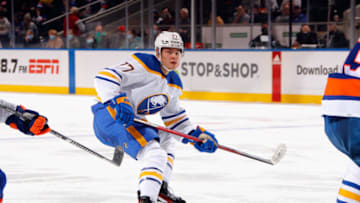 ELMONT, NEW YORK - DECEMBER 30: JJ Peterka #77 of the Buffalo Sabres skates against the New York Islanders at the UBS Arena on December 30, 2021 in Elmont, New York. (Photo by Bruce Bennett/Getty Images)