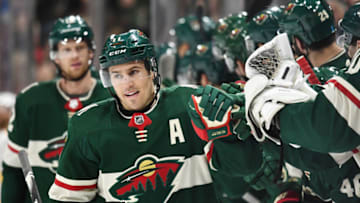 Mar 3, 2020; Saint Paul, Minnesota, USA; Minnesota Wild forward Zach Parise (11) celebrates his third period goal during a game with the Nashville Predators at Xcel Energy Center. Mandatory Credit: Nick Wosika-USA TODAY Sports