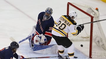 Mar 23, 2016; New York, NY, USA; Boston Bruins right wing Lee Stempniak (20) scores a goal against New York Rangers goalie Henrik Lundqvist (30) during second period at Madison Square Garden. Mandatory Credit: Noah K. Murray-USA TODAY Sports