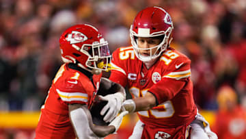 Jan 23, 2022; Kansas City, Missouri, USA; Kansas City Chiefs quarterback Patrick Mahomes (15) hands off to running back Jerick McKinnon (1) during the second half in an AFC Divisional playoff football game against the Buffalo Bills at GEHA Field at Arrowhead Stadium. Mandatory Credit: Jay Biggerstaff-USA TODAY Sports