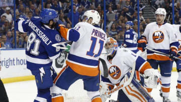 Apr 30, 2016; Tampa, FL, USA; New York Islanders goalie Thomas Greiss (1) and center Shane Prince (11) push Tampa Bay Lightning center Jonathan Marchessault (81) during the third period of game two of the second round of the 2016 Stanley Cup Playoffs at Amalie Arena. Tampa Bay Lightning defeated the New York Islanders 4-1.Mandatory Credit: Kim Klement-USA TODAY Sports