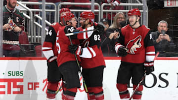 GLENDALE, AZ - FEBRUARY 07: Jordan Oesterle #82 of the Arizona Coyotes celebrates with teammates Nick Cousins #25, Kevin Connauton #44 and Christian Fischer #36 after scoring a goal against the Columbus Blue Jackets during the second period at Gila River Arena on February 7, 2019 in Glendale, Arizona. (Photo by Norm Hall/NHLI via Getty Images)