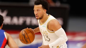 Dallas Mavericks guard Jalen Brunson (13) dribbles the ball during the first quarter against the Detroit Pistons Credit: Raj Mehta-USA TODAY Sports