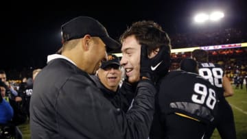 AMES, IA - NOVEMBER 16: Head coach Matt Campbell of the Iowa State Cyclones celebrates with place kicker Connor Assalley #96 of the Iowa State Cyclones after he kicked the game winning field goal against the Texas Longhorns at Jack Trice Stadium on November 16, 2019 in Ames, Iowa. The Iowa State Cyclones won 23-21 over the Texas Longhorns. (Photo by David Purdy/Getty Images)
