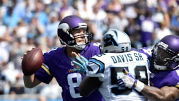Sep 25, 2016; Charlotte, NC, USA; Minnesota Vikings quarterback Sam Bradford (8) passes the ball as Carolina Panthers outside linebacker Thomas Davis (58) pressures in the second quarter at Bank of America Stadium. Mandatory Credit: Bob Donnan-USA TODAY Sports