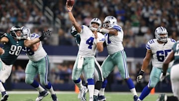 Oct 30, 2016; Arlington, TX, USA; Dallas Cowboys quarterback Dak Prescott (4) throws a touchdown pass in the fourth quarter against the Philadelphia Eagles at AT&T Stadium. Mandatory Credit: Matthew Emmons-USA TODAY Sports