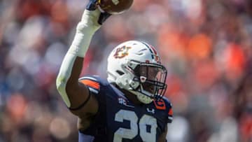 Auburn football defensive lineman Derick Hall (29) celebrates his interception as Auburn Tigers take on Missouri Tigers at Jordan-Hare Stadium in Auburn, Ala., on Saturday, Sept. 24, 2022.