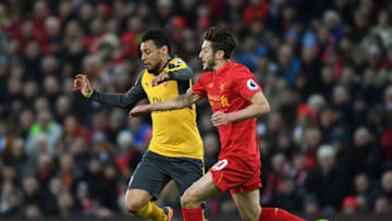 LIVERPOOL, ENGLAND - MARCH 04: Francis Coquelin of Arsenal holds off Adam Lallana of Liverpool during the Premier League match between Liverpool and Arsenal at Anfield on March 4, 2017 in Liverpool, England. (Photo by Stuart MacFarlane/Arsenal FC via Getty Images)