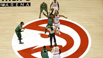 Apr 9, 2016; Atlanta, GA, USA; Boston Celtics forward Amir Johnson (90) and Atlanta Hawks center Al Horford (15) go up for the tipoff to start their game at Philips Arena. Mandatory Credit: Jason Getz-USA TODAY Sports