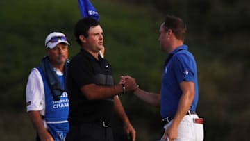 KAPALUA, HAWAII - JANUARY 05: Justin Thomas of the United States shakes hands with Patrick Reed of the United States after defeating him on the third playoff hole on the 18th green during the third round of the Sentry Tournament Of Champions at the Kapalua Plantation Course on January 05, 2020 in Kapalua, Hawaii. (Photo by Harry How/Getty Images)
