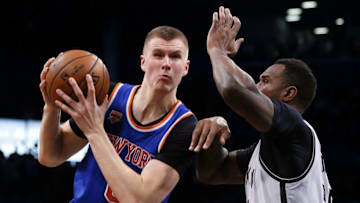Oct 20, 2016; Brooklyn, NY, USA; Brooklyn Nets forward Trevor Booker (35) defends against New York Knicks forward Kristaps Porzingis (6) during first half at Barclays Center. Mandatory Credit: Noah K. Murray-USA TODAY Sports