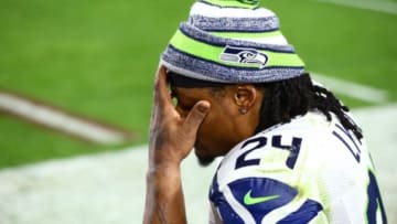 Dec 21, 2014; Glendale, AZ, USA; Seattle Seahawks running back Marshawn Lynch (24) reacts against the Arizona Cardinals at University of Phoenix Stadium. The Seahawks defeated the Cardinals 35-6. Mandatory Credit: Mark J. Rebilas-USA TODAY Sports