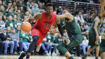 EAST LANSING, MI - JANUARY 4: Bruno Fernando #23 of the Maryland Terrapins drives baseline defended by Xavier Tilman #23 of the Michigan State Spartans at Breslin Center on January 4, 2018 in East Lansing, Michigan. (Photo by Rey Del Rio/Getty Images)