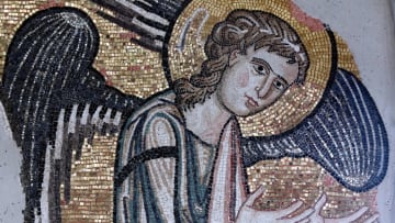 An ancient angel mosaic on a wall of the Church of the Nativity