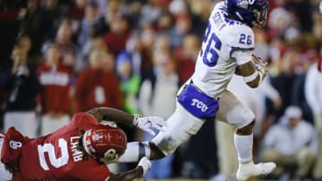 NORMAN, OK - NOVEMBER 23: Safety Vernon Scott #26 of the TCU Horned Frogs intercepts a pass and returns it 98 yards for a touchdown against wide receiver CeeDee Lamb #2 of the Oklahoma Sooners in the fourth quarter on November 23, 2019 at Gaylord Family Oklahoma Memorial Stadium in Norman, Oklahoma. (Photo by Brian Bahr/Getty Images)