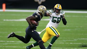 NEW ORLEANS, LOUISIANA - SEPTEMBER 27: Latavius Murray #28 of the New Orleans Saints is pursued by Christian Kirksey #58 of the Green Bay Packers during the first half at Mercedes-Benz Superdome on September 27, 2020 in New Orleans, Louisiana. (Photo by Sean Gardner/Getty Images)