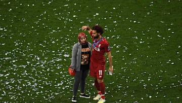 MADRID, SPAIN - JUNE 01: Mohamed Salah of Liverpool celebrates with his wife Magi Salah following the UEFA Champions League Final between Tottenham Hotspur and Liverpool at Estadio Wanda Metropolitano on June 01, 2019 in Madrid, Spain. (Photo by David Ramos/Getty Images)