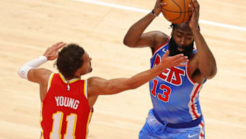 ATLANTA, GEORGIA - JANUARY 27: Trae Young #11 of the Atlanta Hawks defends against James Harden #13 of the Brooklyn Nets during the second half at State Farm Arena on January 27, 2021 in Atlanta, Georgia. NOTE TO USER: User expressly acknowledges and agrees that, by downloading and or using this photograph, User is consenting to the terms and conditions of the Getty Images License Agreement. (Photo by Kevin C. Cox/Getty Images)