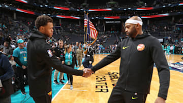 Justin Anderson #1 and Vince Carter #15 of the Atlanta Hawks (Photo by Kent Smith/NBAE via Getty Images)