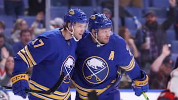 Feb 10, 2022; Buffalo, New York, USA; Buffalo Sabres right wing Kyle Okposo (21) celebrates his goal with center Mark Jankowski (17) during the second period against the Columbus Blue Jackets at KeyBank Center. Mandatory Credit: Timothy T. Ludwig-USA TODAY Sports